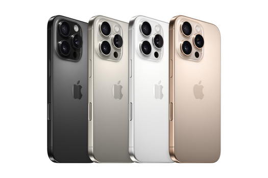 Four smartphones arranged in a row displaying different color finishes with triple rear camera systems.