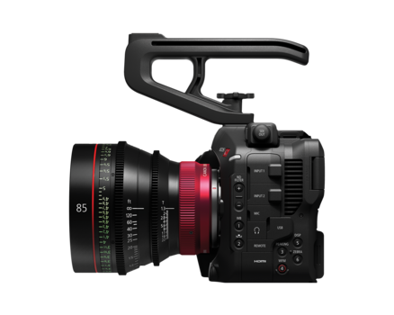 Professional cinema camera with cinema lens and shoulder support rig mounted on top.