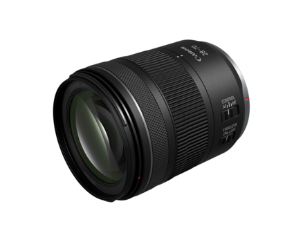 Black telephoto zoom lens with ribbed rubber grip and control rings on white background.