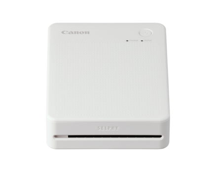 Canon Selphy compact photo printer in white with slot-loading design.