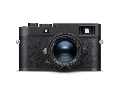 Leica M rangefinder camera with black leather body and blue-tinted lens, shown straight-on against white background.
