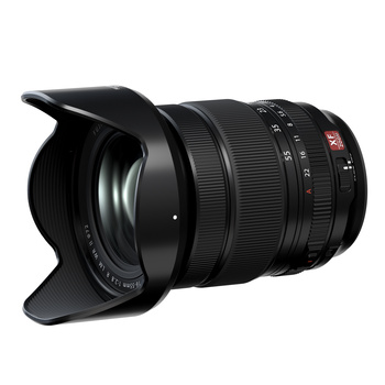 Black wide-angle zoom lens with attached lens hood, shown in profile against white background.