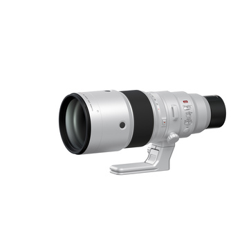 White and black telephoto lens with focus ring and depth-of-field scale markings.