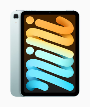 iPad Mini tablet displaying colorful gradient design with orange, yellow, and blue curved shapes on dark background.