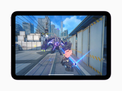 Screenshot of an action game showing a character wielding a blue energy weapon facing a purple alien creature on an urban street.