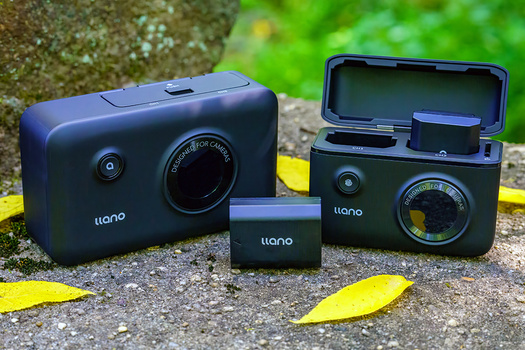 Three compact Llano cameras displayed on a textured surface with yellow leaves, showing different models and sizes.