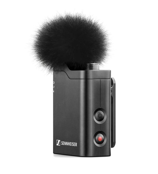 Sennheiser wireless microphone with fuzzy windscreen attachment and control buttons on dark background.