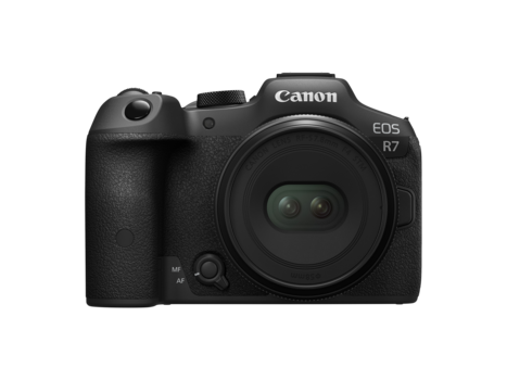 Canon EOS R7 mirrorless camera front view with lens attached.