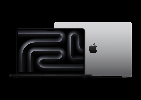 Two open laptops displaying sleek, modern industrial designs with glowing curved line graphics on dark screens.