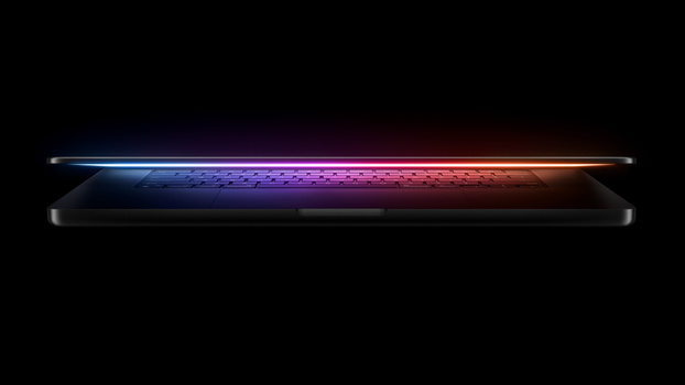 Sleek black device with illuminated top edge displaying a gradient spectrum from blue through purple to orange and red.