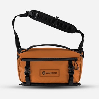 Orange and black shoulder camera bag with padded straps and multiple zippered compartments.