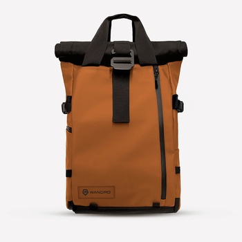 Orange and black roll-top backpack with buckle closure and side straps against white background.