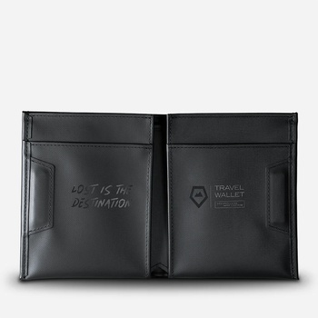 Open black leather bifold wallet displaying interior card slots and embossed text on both panels.