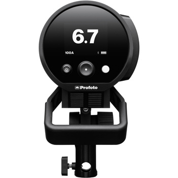Profoto flash head mounted on stand displaying 6.7 power output on digital display.