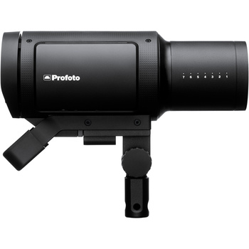 Profoto B10 Plus monolight flash head mounted on stand with carrying handle and power controls visible.