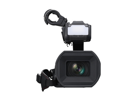 Professional compact video camera with attached microphone and LED light mounted on top.
