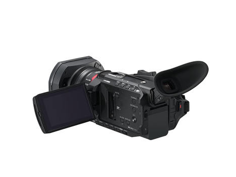 Professional camcorder with extended zoom lens, articulating LCD screen, and shotgun microphone mounted on top.