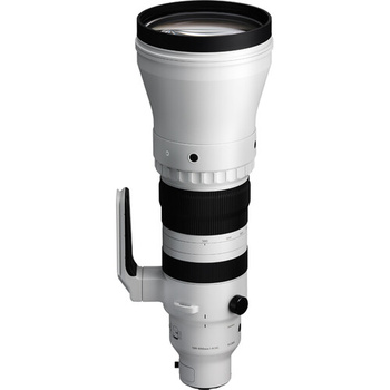White and black telephoto lens with focus ring and tripod collar against white background.