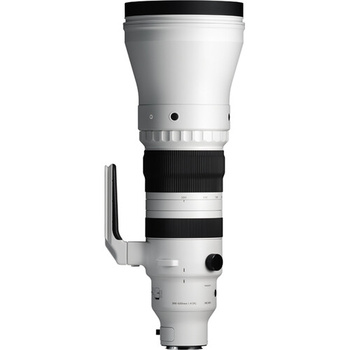 White telephoto lens with black focus ring and tripod collar mount on white background.