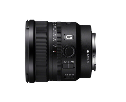 Sony G-series prime lens with autofocus and manual focus ring against white background.