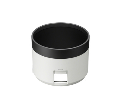 White cylindrical rice cooker with black lid and control panel button.