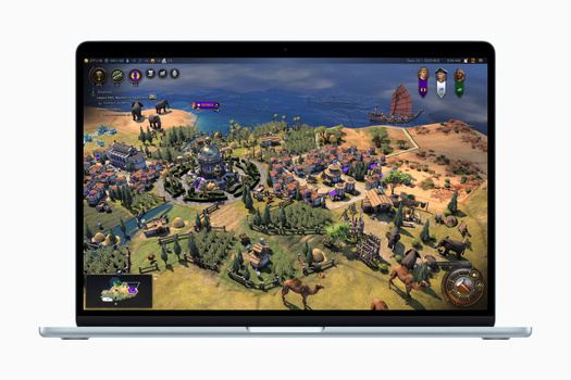 Screenshot of a strategy game displayed on a laptop screen showing an overhead map view of a civilization settlement.