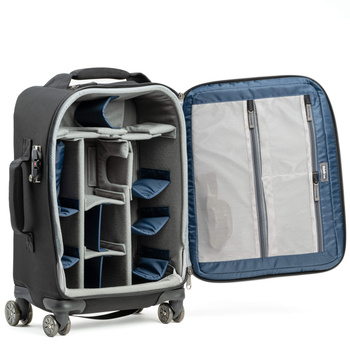 Rolling camera bag with open compartment revealing padded dividers and organizational pockets.