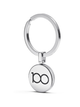 Chrome key ring with spherical charm engraved with infinity symbol.