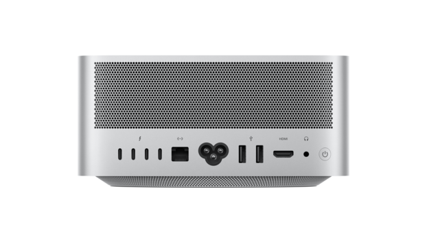 Front view of a silver desktop computer tower with perforated metal grille and row of I/O ports and buttons.