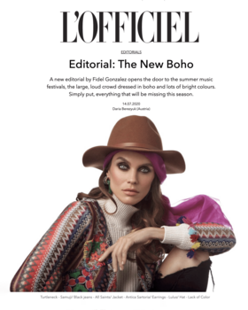 Fashion editorial cover featuring model wearing brown wide-brimmed hat and colorful patterned cardigan.