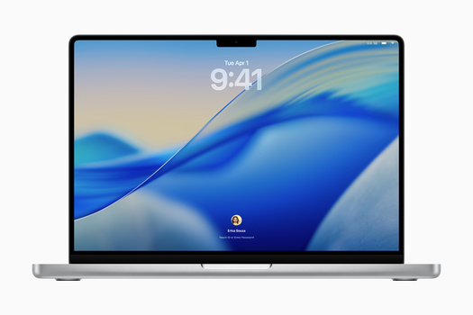 MacBook Pro displaying lock screen with blue wave wallpaper and time 9:41.