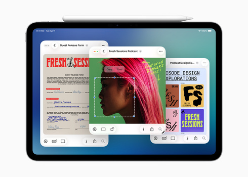 Screenshot of iPad displaying multiple design portfolio windows with typography, vibrant imagery, and creative layouts.