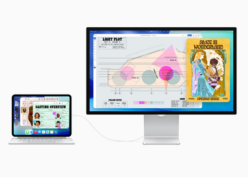Screenshot showing educational software displayed across laptop and desktop monitors with data visualization and instructional materials.