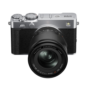 Fujifilm X100V compact camera with fixed prime lens, shown from front angle against white background.