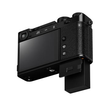 Compact mirrorless camera with articulating screen and vertical grip attachment shown from rear three-quarter view.