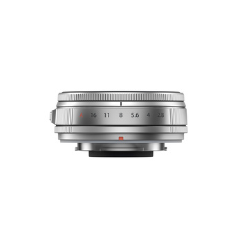 Silver compact prime lens with focus ring and distance scale markings on white background.