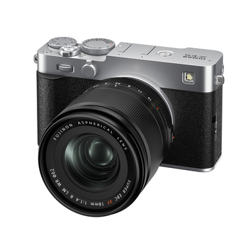 Fujifilm X100V compact digital camera with silver top plate and black body, shown with attached prime lens.