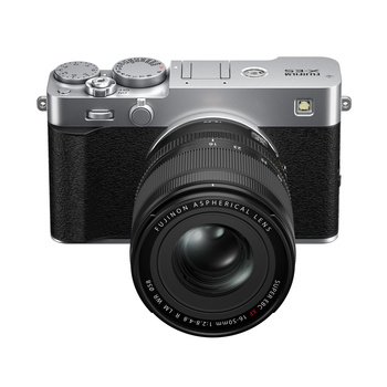 Fujifilm X100V compact camera with fixed prime lens against white background.