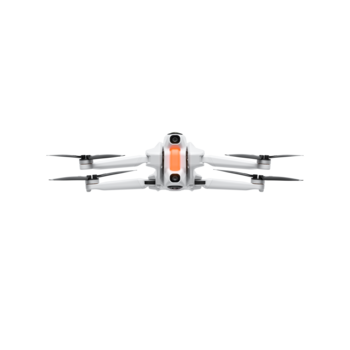 Compact quadcopter drone with four propellers and central camera module displayed in frontal view.