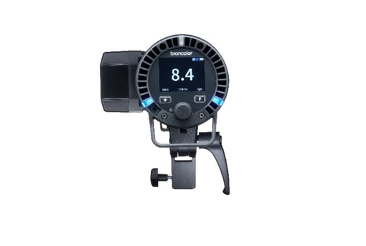 Exposure meter with circular digital display mounted on adjustable bracket and handle.