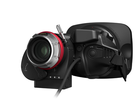 Professional cinema camera with red ring lens mount and articulating monitor arm on black body.
