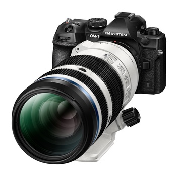 OM System mirrorless camera with attached telephoto zoom lens featuring white and black barrel design.