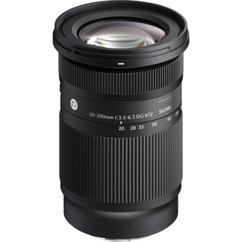 Black telephoto zoom lens with ribbed focusing ring and distance scale markings.