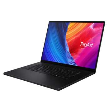Black laptop displaying colorful abstract gradient design on screen.