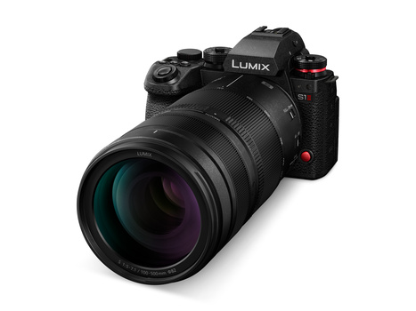 Panasonic Lumix full-frame mirrorless camera with attached telephoto zoom lens against white background.