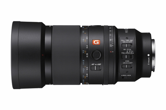 Sony G-series telephoto lens with focus ring, aperture controls, and AF/MF switch visible against white background.