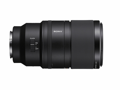 Sony telephoto zoom lens with focus ring and AF/MF switch on dark background.