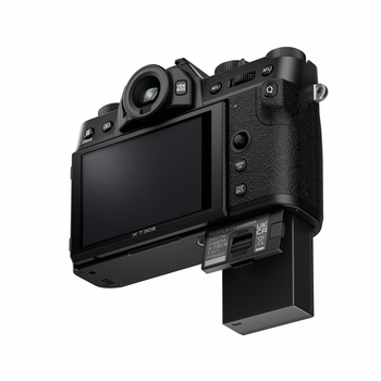 Mirrorless camera with articulating LCD screen tilted outward and downward.