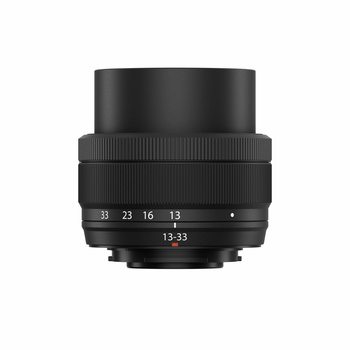 Black prime lens with focal length markings and ribbed focus ring displayed against white background.
