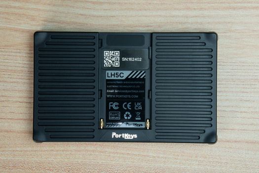 Back view of a black portable monitor showing ventilation grilles, model number SN-962402, LHSC branding, and regulatory markings.